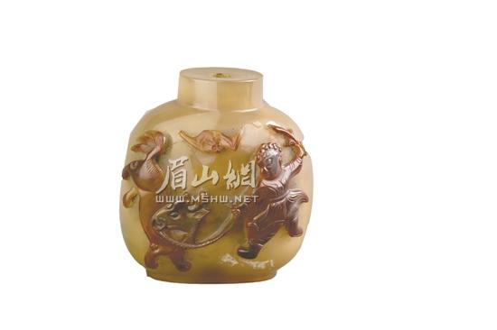 簡介：三級文物，呈扁圓形，正面浮雕一童子牽著麒麟，上為一飛行蝙蝠。.jpg